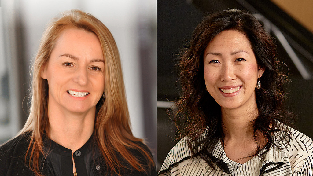 A couple of women smiling.